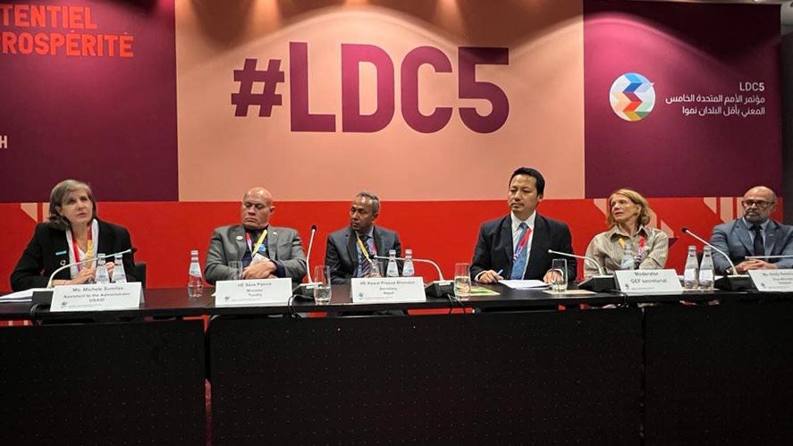 Panel of men and women speakers at the event LDC5