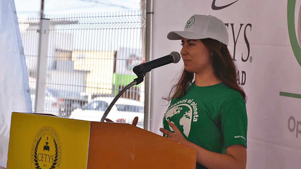 Girl speaking at a podium