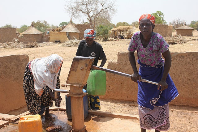 Burkina Faso- Droughts often force women to walk more miles to fetch the water for their homes. Photo by Patrizia Cocca/GEF