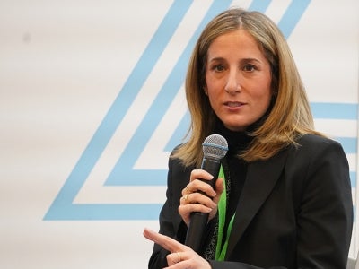 Woman with microphone at an event