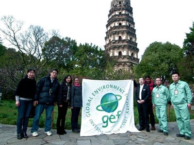 GEF and project staff stand in front of a pagoda at Suzhou’s Tiger Hill, which was a demonstration site using safe alternatives to Mirex and Chlordane to prevent termite infestations and protect cultural heritage sites. Since 2009, China has banned production of toxic chemicals, including Mirex and Chlordane, which had previously been the preferred method of pest control at such sites.