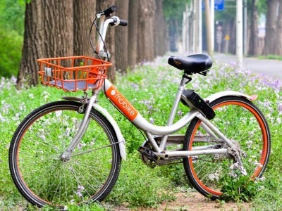 Mobike dockless bikeshare bicycle near bike path in China. Photo: tangxn/Shutterstock.