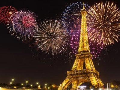 Eiffel Tower with fireworks in background