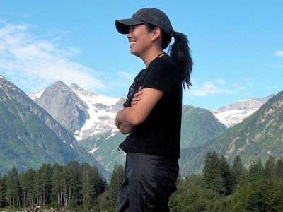 Aileen Lee portrait in front of a mountian landscape