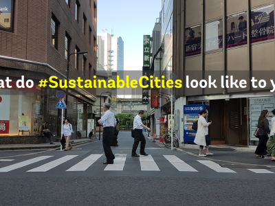Intersection in Japan with text overlay \"What do #SustainableCities look like to you?\"