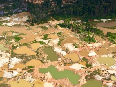 A bird's-eye view of gold mines in Guyana. Photo by Evelyn Swain. 