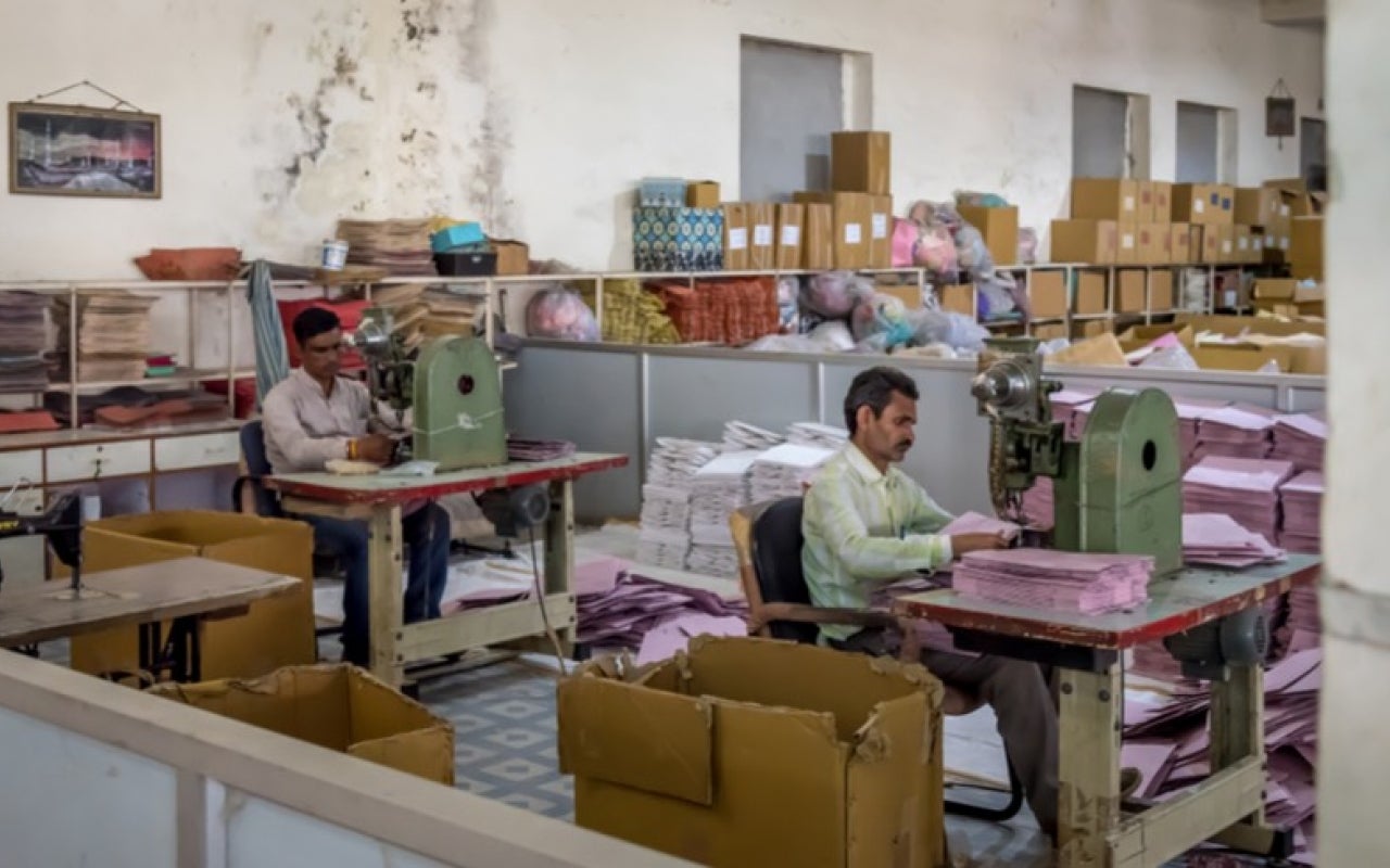 Employees work inside a garment factory in Jaipur, India. 
