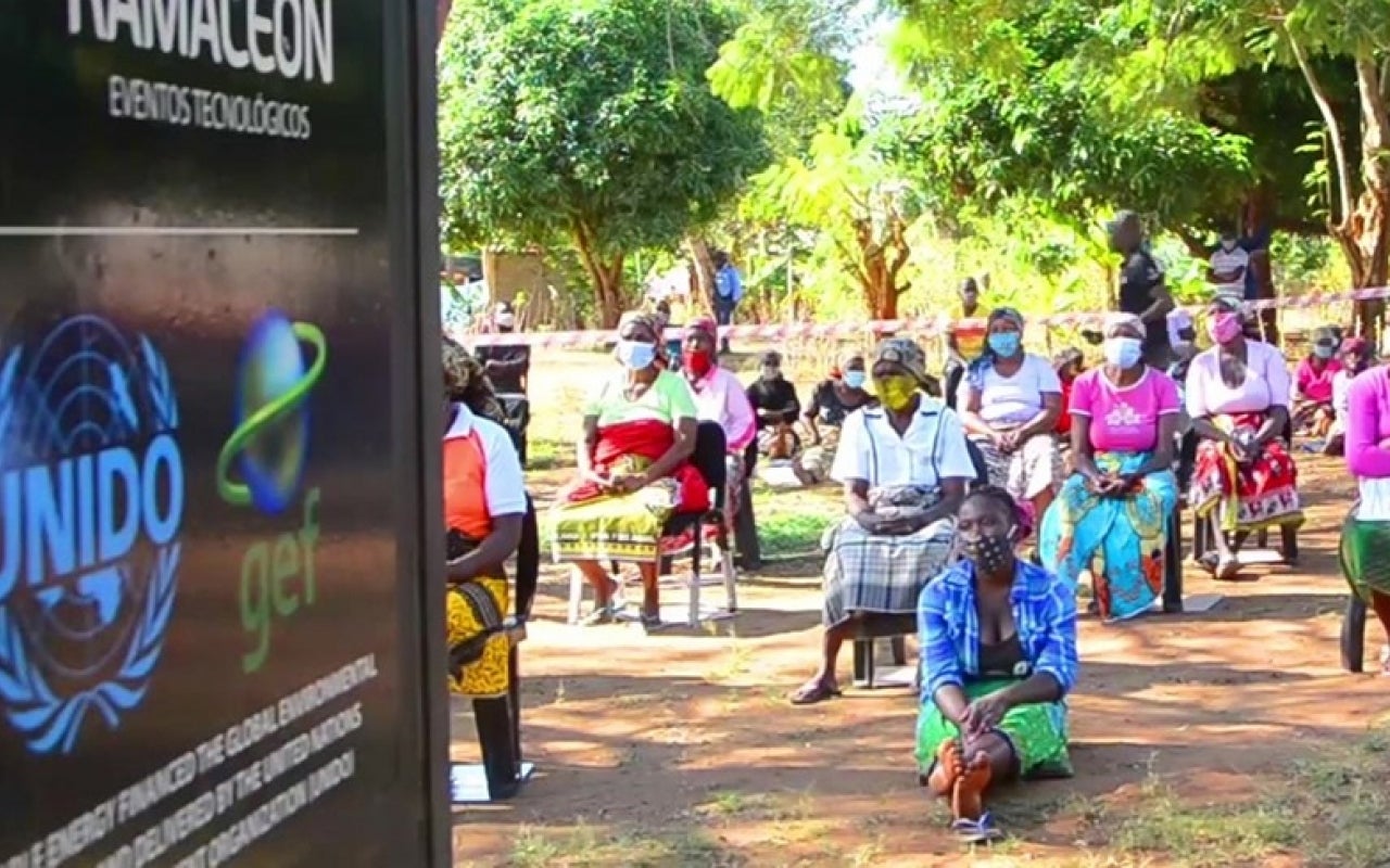 Mozambican women sit for a tablet presentation