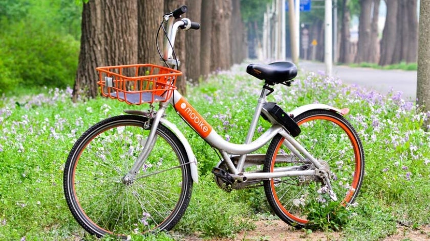 Mobike dockless bikeshare bicycle near bike path in China. Photo: tangxn/Shutterstock.