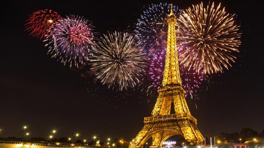 Eiffel Tower with fireworks in background