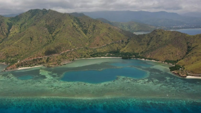 Aerial view of Timor-Leste with ocean in foreground