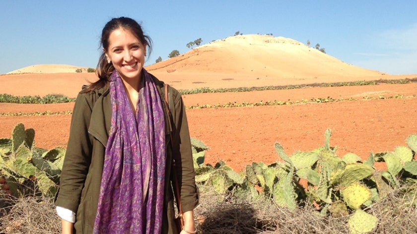 Milena Gonzalez Vasquez in front of a Moroccan landscape