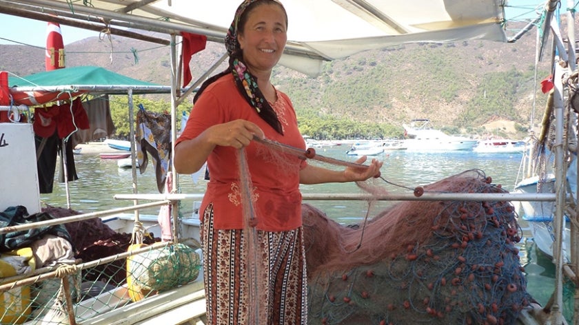 Turkish fisherwoman with nets