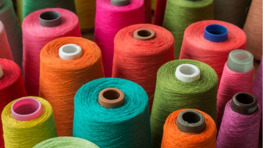 Colorful spools of fabric